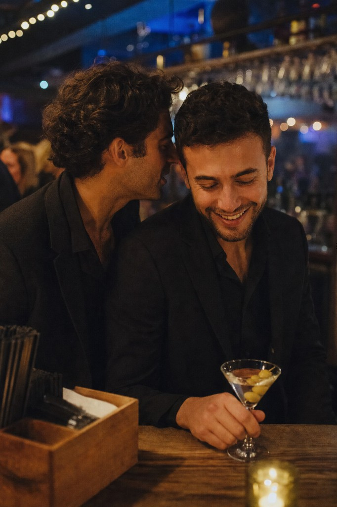 Late night at the bar, martini in hand